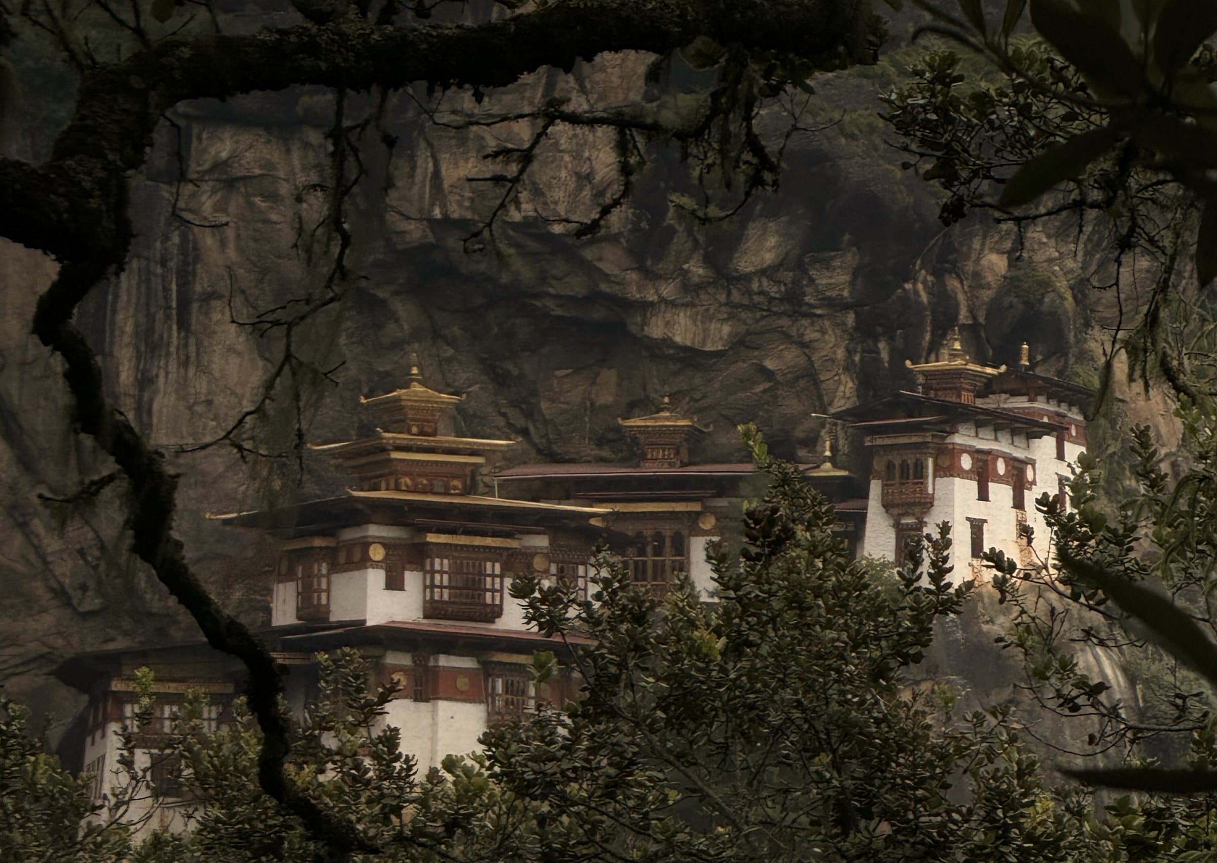Tiger’s Nest monastery framed by trees on its forested cliffside